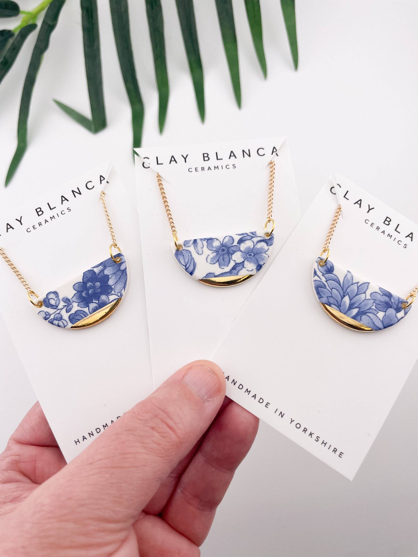 Blue China Semi Circle Pendant necklace with gold tip